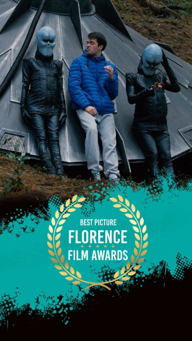 Alien Addiction promo: a man in a blue jacket between two blue aliens by a spaceship, with a Florence Film Awards laurel