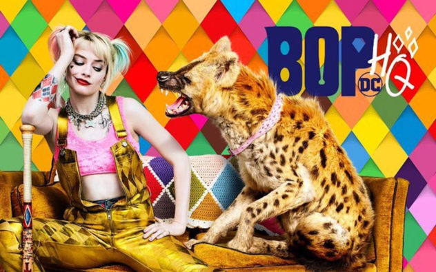 Birds of Prey promo art: Margot Robbie as Harley Quinn lounging on a couch beside a snarling hyena