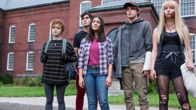Still from The New Mutants: five young mutants stand outside a brick building