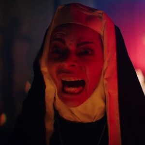 Still from The Parish: a screaming nun bathed in red light