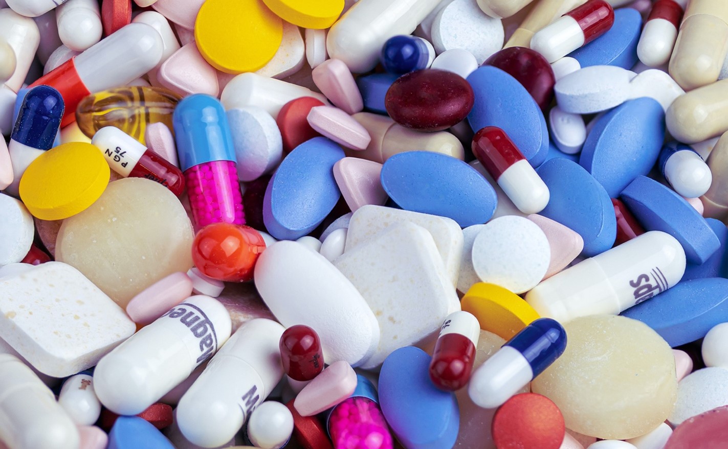 A heap of colorful pills and capsules