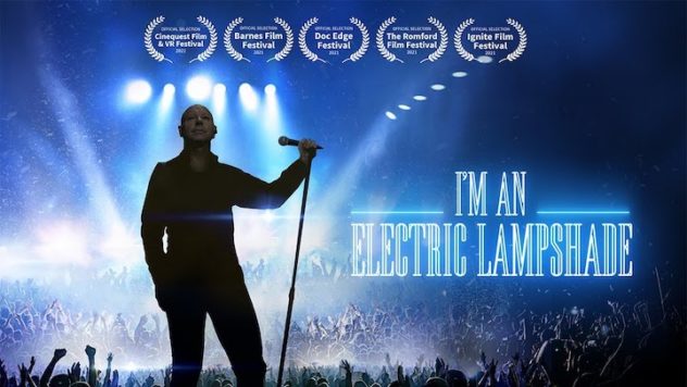 Poster for I'm An Electric Lampshade: a singer silhouetted with a microphone stand before a crowd
