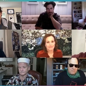 Zoom-style video grid of the Ghostbusters cast reunion, each actor in their own home