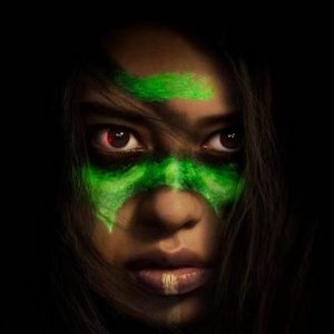 Poster art for Prey: a woman's face painted with a green stripe across her eyes