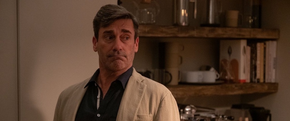Still from Confess, Fletch: Jon Hamm as Fletch gives a skeptical look in a kitchen