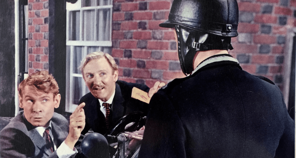 Stanley Baxter and Leslie Phillips with a motorcycle policeman in The Fast Lady (1962)