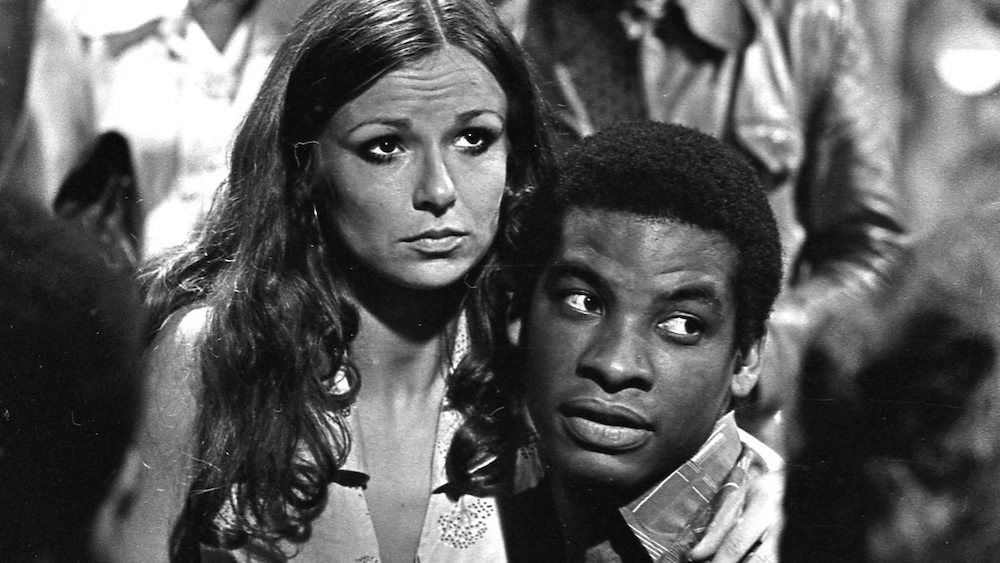 Black-and-white still of Julie Walters and Don Warrington from Second City Firsts (1975)