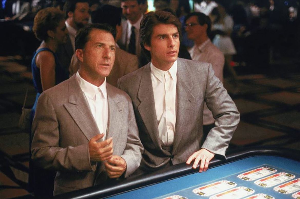Still from Rain Man: Raymond and Charlie Babbitt stand at a casino blackjack table