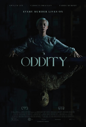 Poster for Oddity: a pale woman with arms spread over a table, a skull reflected beneath her
